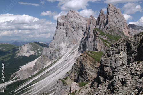 Panoramic view of the mountains with Seceda mountain in the foreground in Puez Odle National Park in Dolomites, South Tyrol region, Italy