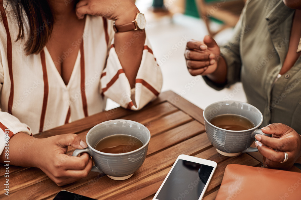 Relax, hands and friends in coffee shop for talking, conversation or discussion in restaurant. Women, above or people drinking tea beverage on break together in cafe for reunion, news or gossip story Relax, hands and friends in coffee shop for talking, conversation or discussion in restaurant. Women, above or people drinking tea beverage on break together in cafe for reunion, news or gossip story