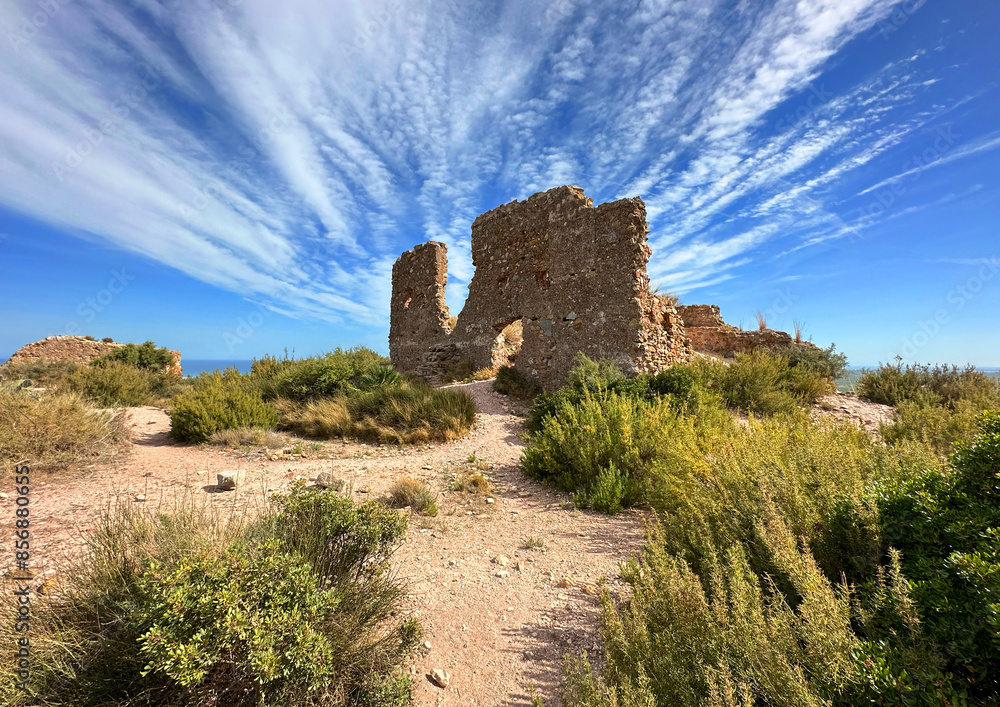 Ruins of Castillo De Almenara (Castell d'Almenara). Fortress ruins in mountains. Ruined fort on top of a mountain. Ruins of Castillo De Almenara (Castell d'Almenara). Fortress ruins in mountains. Ruined fort on top of a mountain.