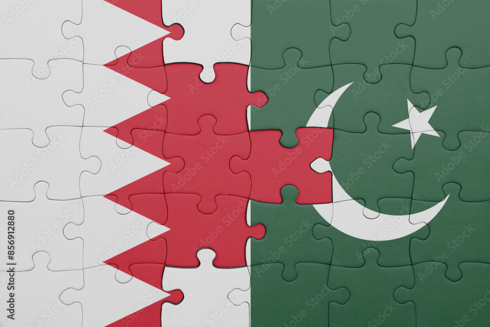 puzzle with the colourful national flag of pakistan and flag of bahrain ...