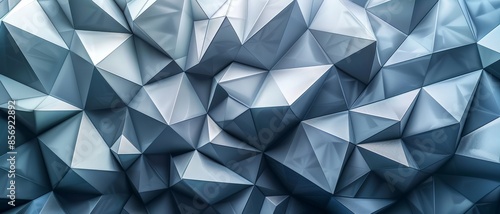 Abstract geometric background with blue and gray triangle shapes.