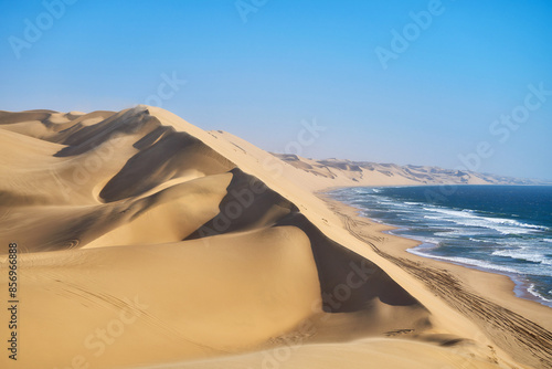 Dunes and the ocean coast near Walvis Bay in Namibia