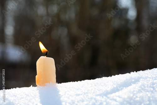 Candle In The Snow