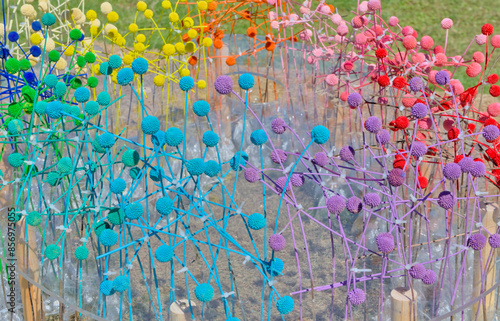 Foto Colorful balls and sticks chaotically arranged to decorate an open space, improm