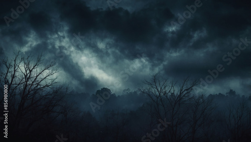 Eerie grunge smoke texture over dark sky, ominous clouds, horror-themed backdrop.