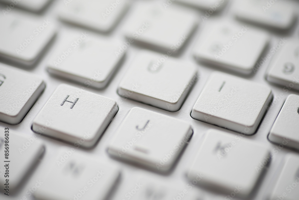 Close-Up of White Keyboard Keys in Modern Minimalist Design Close-Up of White Keyboard Keys in Modern Minimalist Design