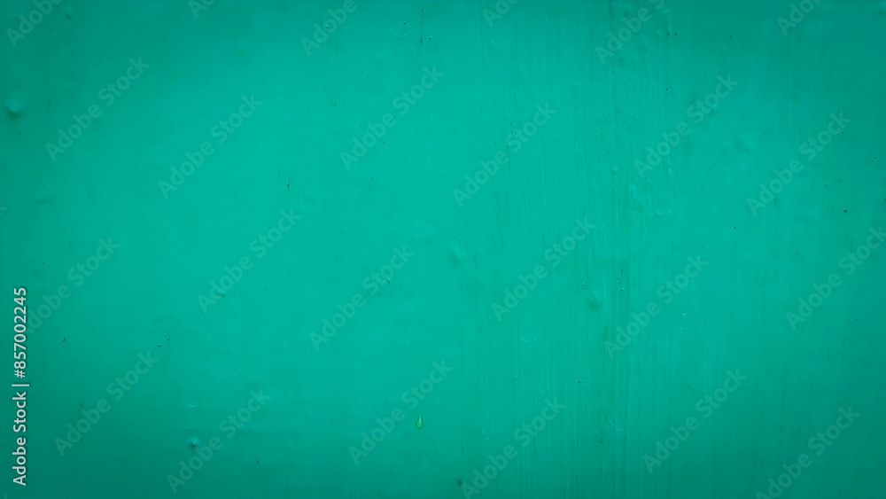 Solid green wall providing a smooth and vibrant background. Perfect for design elements, text overlay, and creative projects Solid green wall providing a smooth and vibrant background. Perfect for design elements, text overlay, and creative projects