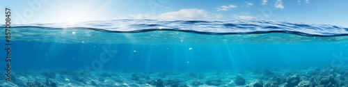 The ocean in section. The image shows a blue sky at the top and the sea cut along the bottom