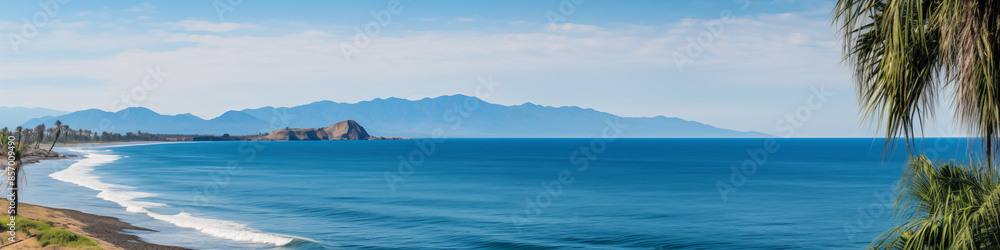 A beautiful ocean view with a palm tree in the background A beautiful ocean view with a palm tree in the background