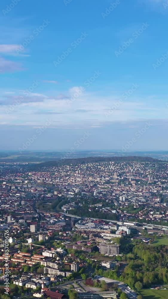 Zurich Skyline and Zurich Lake from Uetliberg Mountain on Sunny Day. Switzerland. Aerial View. Drone Moves Sideways. Vertical Video Zurich Skyline and Zurich Lake from Uetliberg Mountain on Sunny Day. Switzerland. Aerial View. Drone Moves Sideways. Vertical Video