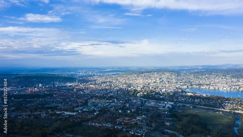 Zurich Skyline and Zurich Lake from Uetliberg Mountain on Sunny Day. Switzerland. Aerial Hyper Lapse, Time Lapse. Drone Moves Sideways Zurich Skyline and Zurich Lake from Uetliberg Mountain on Sunny Day. Switzerland. Aerial Hyper Lapse, Time Lapse. Drone Moves Sideways