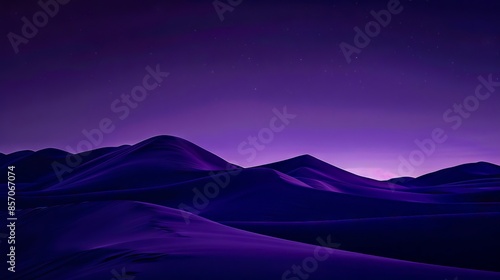 A purple night sky with mountains and sand dunes.