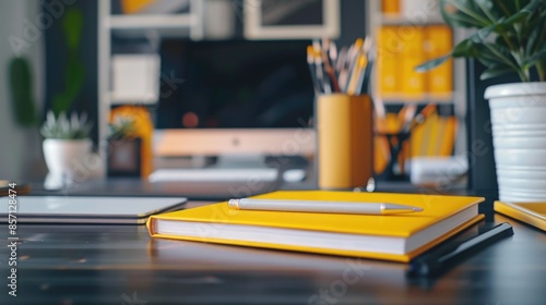 Wallpaper Mural A simple office desk setup featuring a laptop, notebook, and pen Torontodigital.ca