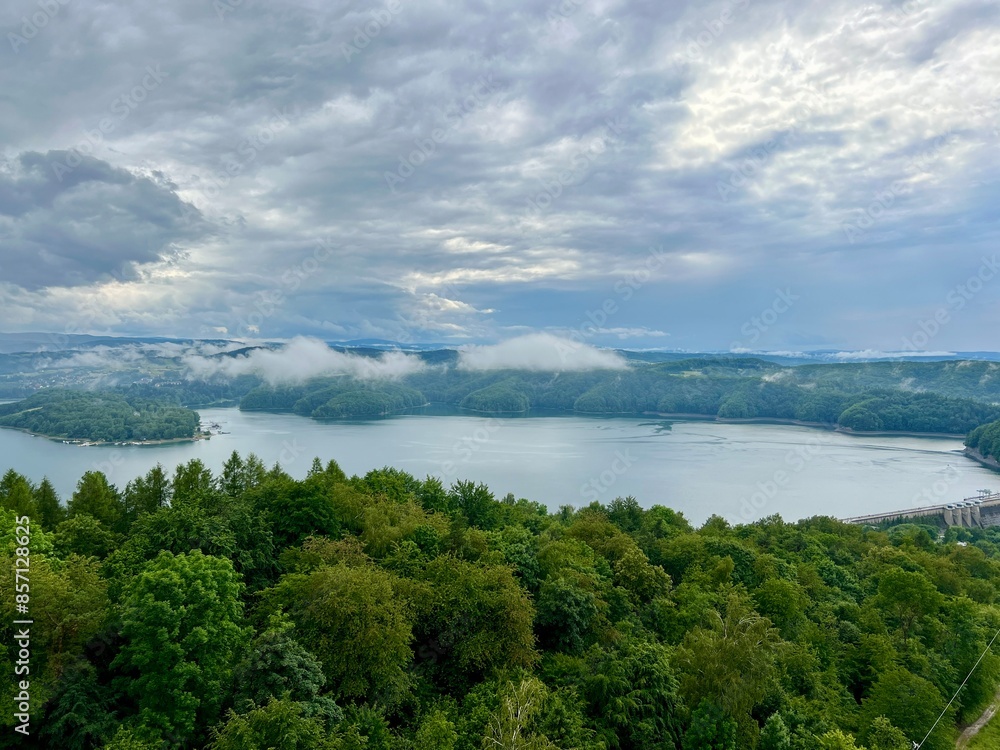 Lake Solina is a largest in Poland water reservoir surrounded by a characteristic landscape of mountains covered with forest and plenty of beaches with tourist infrastructure. Lake Solina is a largest in Poland water reservoir surrounded by a characteristic landscape of mountains covered with forest and plenty of beaches with tourist infrastructure.