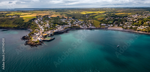 Aerial view of the Cornish fishing village of Coverack and its historic harbour