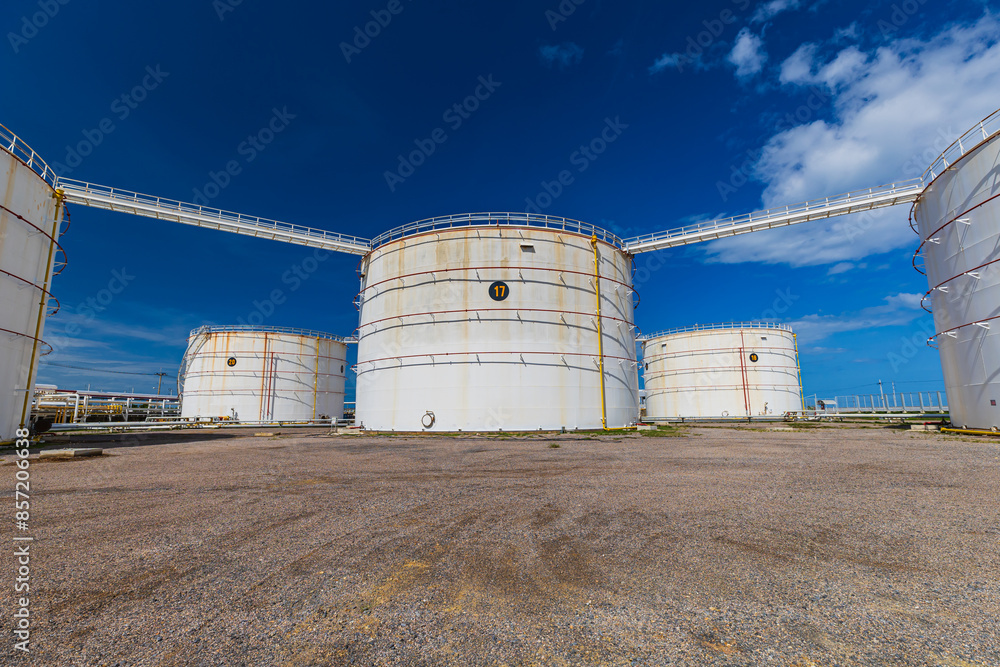 View of the new installation crude oil storage tank in the tank farm. storage tanks can be used to hold materials such View of the new installation crude oil storage tank in the tank farm. storage tanks can be used to hold materials such