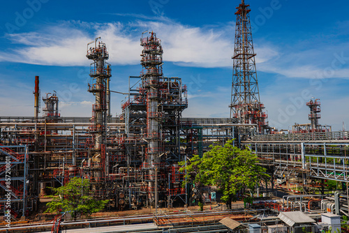 Fotografie Oil​ refinery​ and​ plant and tower column of Petrochemistry industry in oil​ an