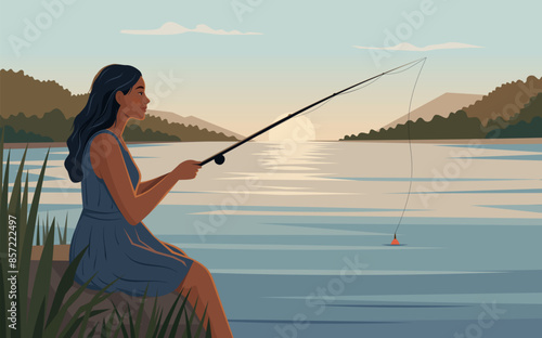 Beautiful girl on the shore of the lake, enjoying the moment of fishing.