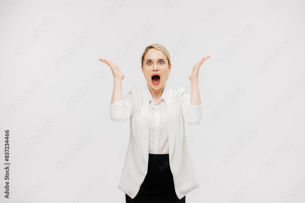 Portrait of a modern business woman feeling surprised by positive news. Concept of emotions and business people. Portrait of a modern business woman feeling surprised by positive news. Concept of emotions and business people.