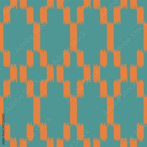 Seamless ikat geometrical pattern on green background.