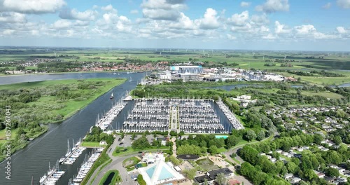 Makkum overview, Friesland, The Netherlands. Makkumerdiep canal. Aerial view. photo