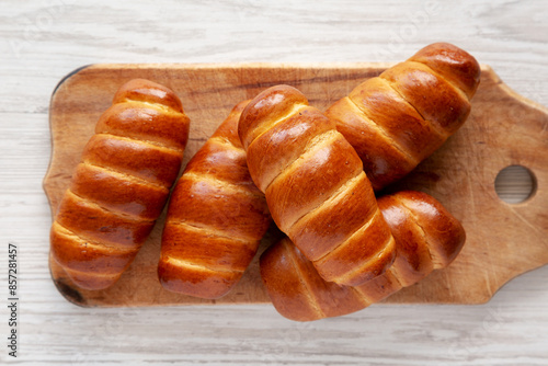 Canvas Print Homemade Kolache Rolls on a rustic wooden board, top view