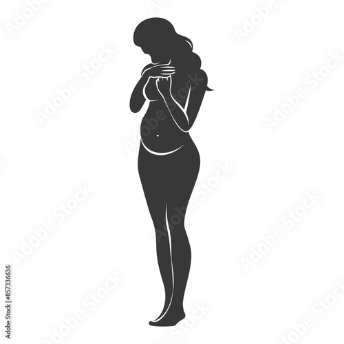 Silhouette of Pregnant Woman: Expectant Mother's Embrace.