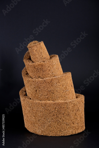 Wallpaper Mural Sample of a layer of rolled coconut fiber on black background Torontodigital.ca