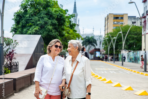 Senior mother and daugther travelling togeher having fun. Senior adults in Cali Colombia. Senior lifestyle. Senior travel.