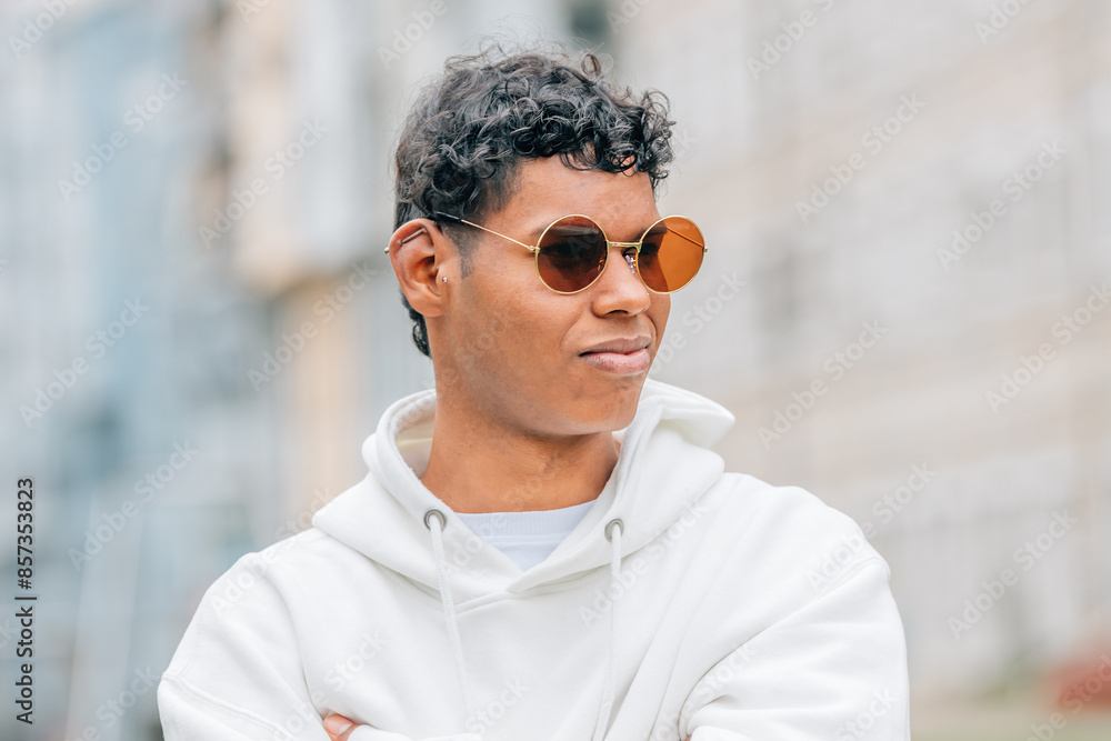 portrait young man with sunglasses on the street portrait young man with sunglasses on the street