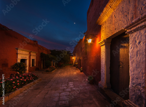 Santa Catalina monastery spans over 20,000 square meters and is almost like a small city within Arequipa. Its layout includes streets, plazas, fountains, and various buildings. photo