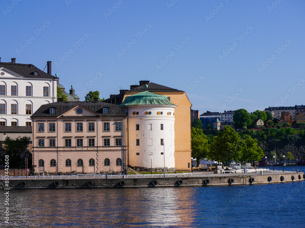 Obraz premium View of old buildings by the river