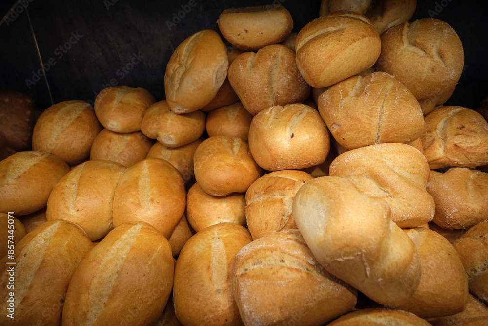 Freshly baked bread rolls lie in the display of a bakery Freshly baked bread rolls lie in the display of a bakery