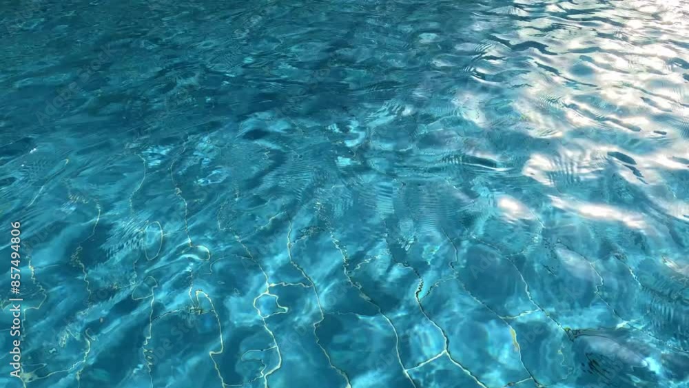 Water surface in the pool. Swimming pool background. Blue water texture. Water surface in the pool. Swimming pool background. Blue water texture.
