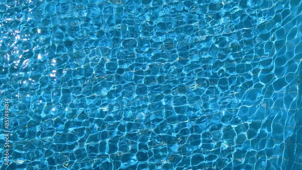Water surface in the pool. Swimming pool background. Blue water texture. Water surface in the pool. Swimming pool background. Blue water texture.
