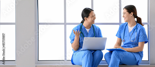 Female Asian doctors with l...