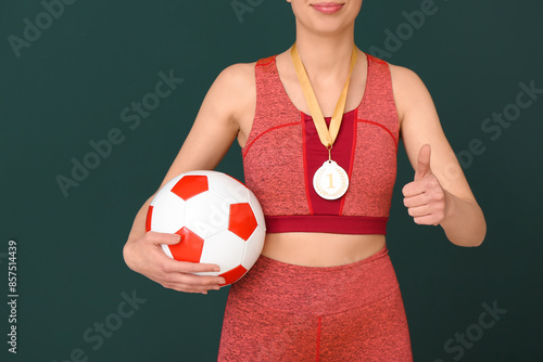 Female football player with...