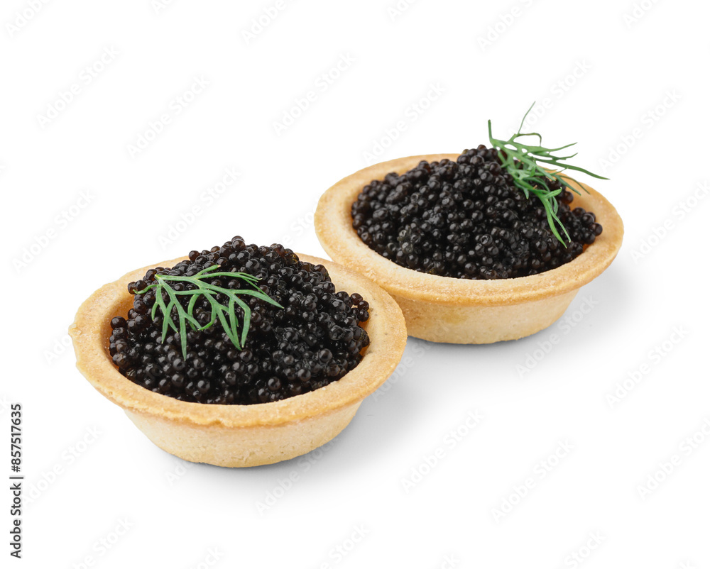 Tasty tartlets with black caviar on white background Tasty tartlets with black caviar on white background
