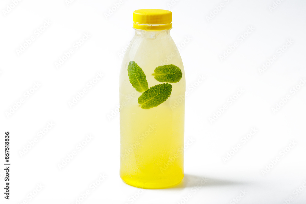 melon smoothie in a bottle on white background, summer drink, cocktail melon smoothie in a bottle on white background, summer drink, cocktail