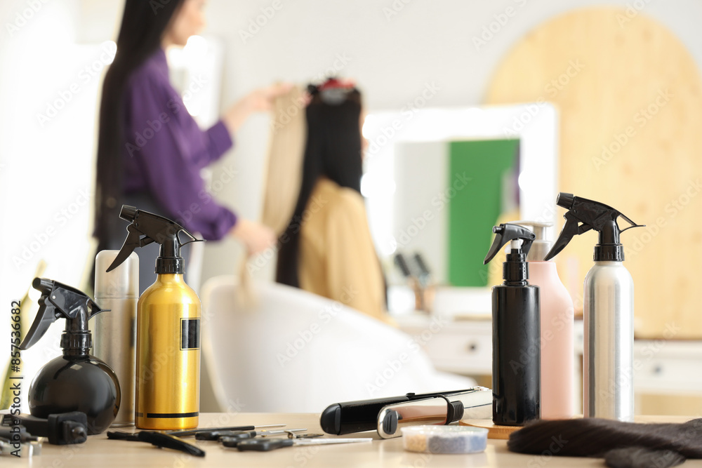 Hair extension tools on table in beauty salon, closeup Hair extension tools on table in beauty salon, closeup