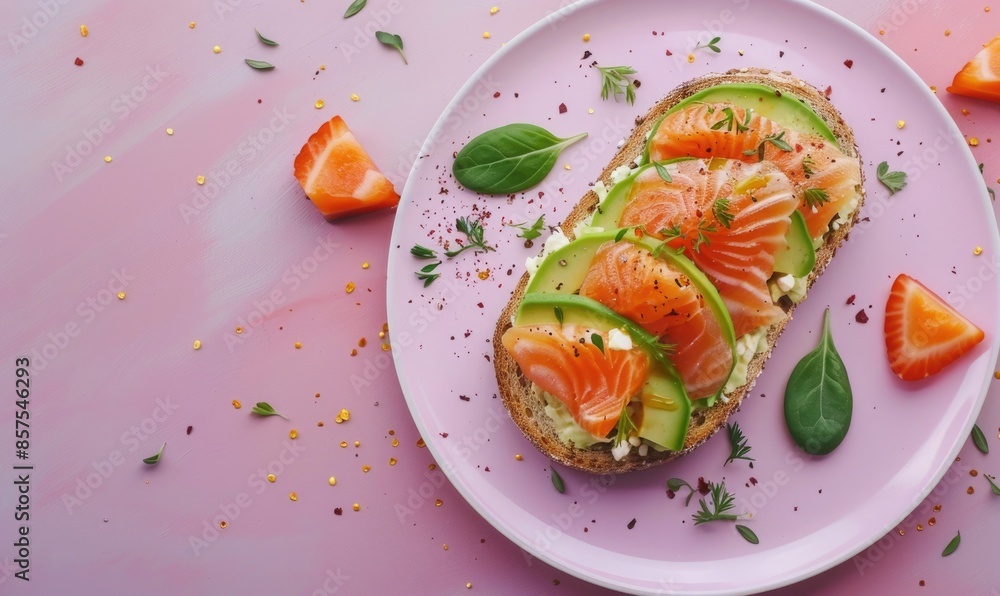 Avocado and salmon toast on a pastel purple plate Avocado and salmon toast on a pastel purple plate