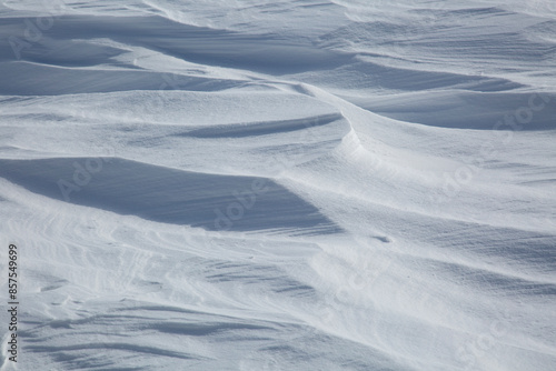 Tablou pe pânză Fresh White Wintery Wind Blown Snow Drifts Background Image With Highlights and