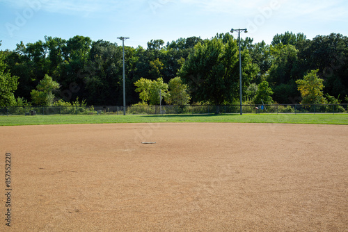Canvastavla Empty Small Town Baseball Field Park under a Clear Blue Sky