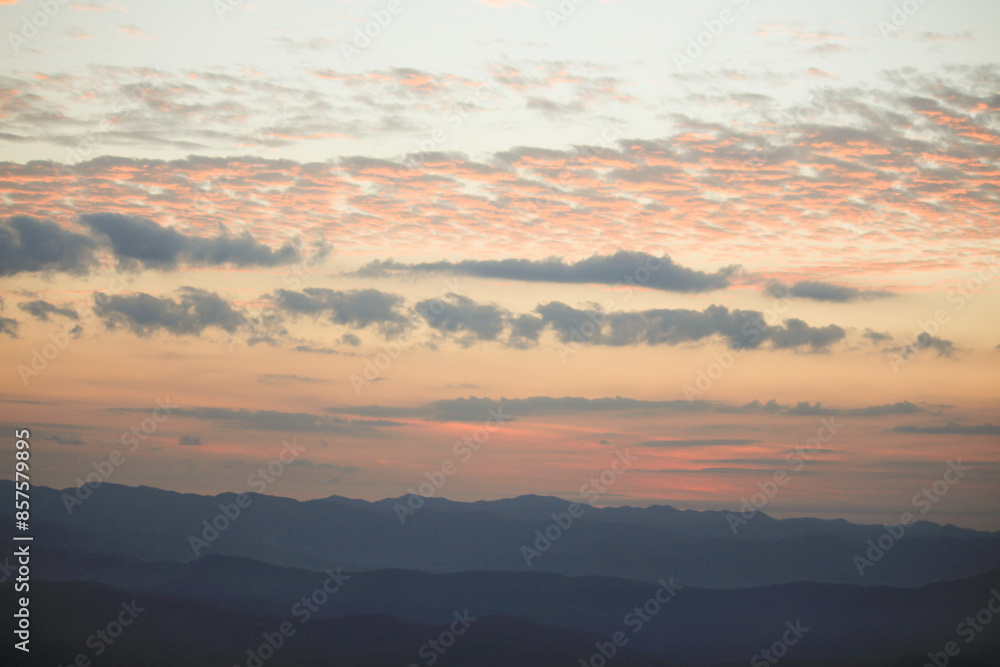 Beautiful sunrise over the mountains with mist, sky and cloud. Fresh and relax type nature landscape. Dramatic outdoor scene Beautiful sunrise over the mountains with mist, sky and cloud. Fresh and relax type nature landscape. Dramatic outdoor scene