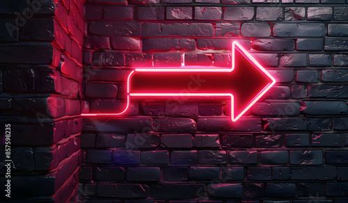 A glowing red neon arrow points right on a dark brick wall. photo