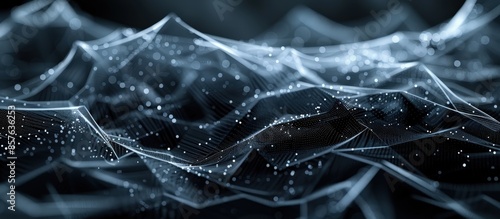 Abstract digital landscape featuring a futuristic wireframe with glowing dots on a dark background, representing technology and data visualization. photo