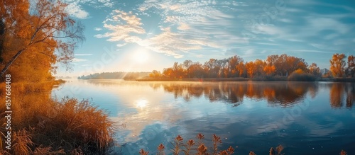 Golden Autumn Landscape with a Still Lake © andri