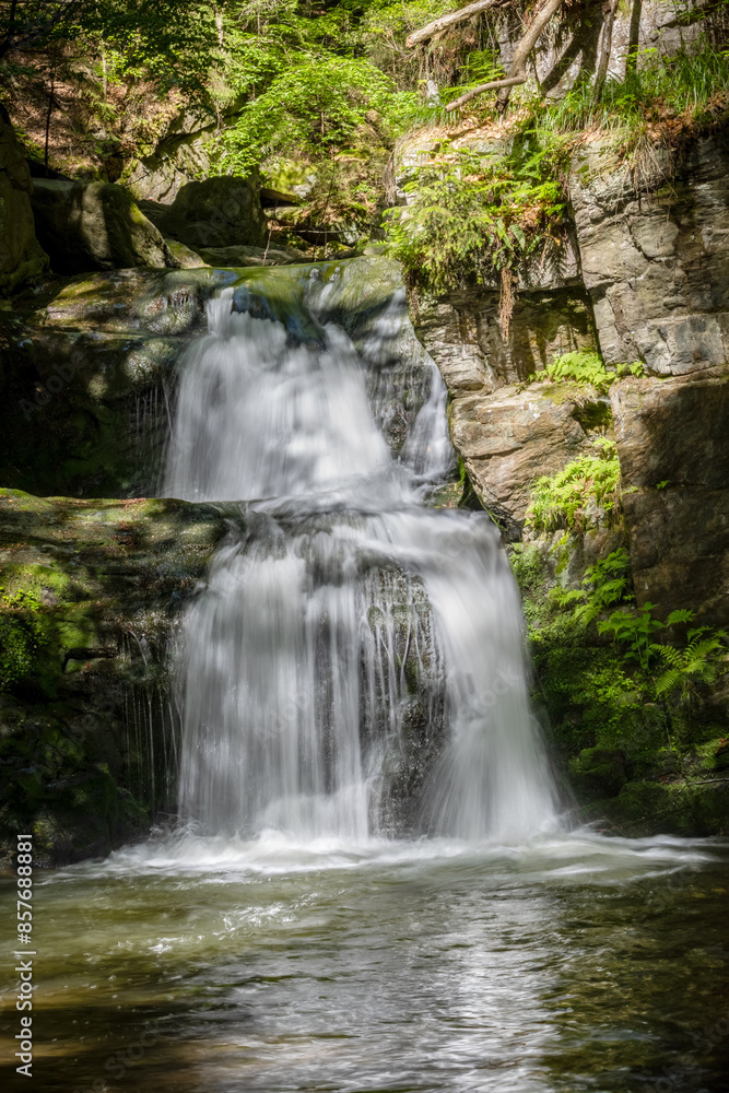 Beautiful waterfall on stony creek in sunny forest - Resovske waterfalls Beautiful waterfall on stony creek in sunny forest - Resovske waterfalls