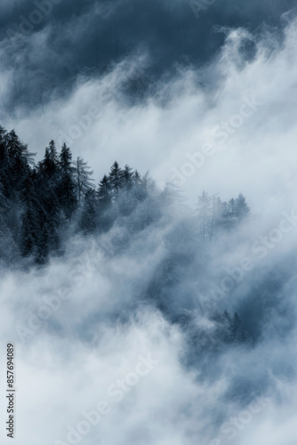 Fog forming abstract patterns as it moves through a landscape, symbolizing the ephemeral and transformative nature of creativity. © grey