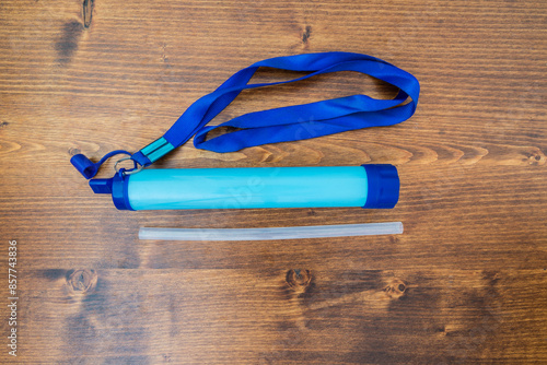 Portable water purifier filter with the option to use it directly in water or attach a bottle to the right side. Suitable for camping, hiking and survival 